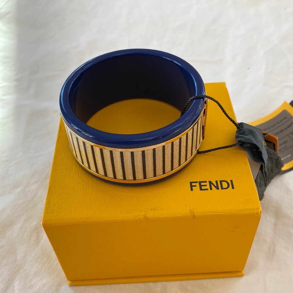 Fendi women’s cuff bracelet.  NWT.  Royal blue with ivory and gold pattern.